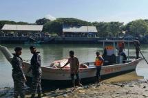  The fishermen radioed in the location of the Rohingya to the authorities and stayed alongside the stricken vessel Handout INDONESIAN POLICE/AFP 