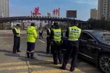 A police checkpoint in Lanzhou, one of the locked down cities. Photo: AFP