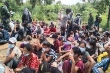 Myanmar migrants are apprehended by Thai military personnel in Kanchanaburi province bordering Myanmar. (Photo: AFP)