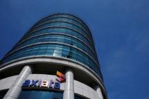 Amidst the benign competition, XL Axiata is looking to raise prices to lift ARPU, but analysts are cautious on this move as this could dampen subs growth. Photo: AFP