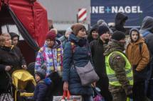 Ukrainian refugees are pictured after crossing the Ukrainian-Polish border in Korczowa on March 02, 2022. Photo: AFP