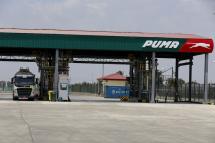 An oil tanker truck stop inside the Puma Energy Asia Sun petroleum products terminal in Thilawa port, Yangon, Myanmar, 06 May. Photo: EPA