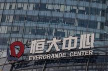 The Evergrande Center logo hangs outside a building in Shanghai, China, 21 September 2021. Photo: EPA