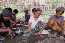 Women are under threat in conflict zones in Myanmar, according to Women's League of Burma. Women preparing plastic bags for transplanting teak and iron timber tree seedlings in In Gan village, Kachin State. Photo: OXFAM Hong Kong
