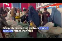Embedded thumbnail for Afghans receive aid packages in Kabul